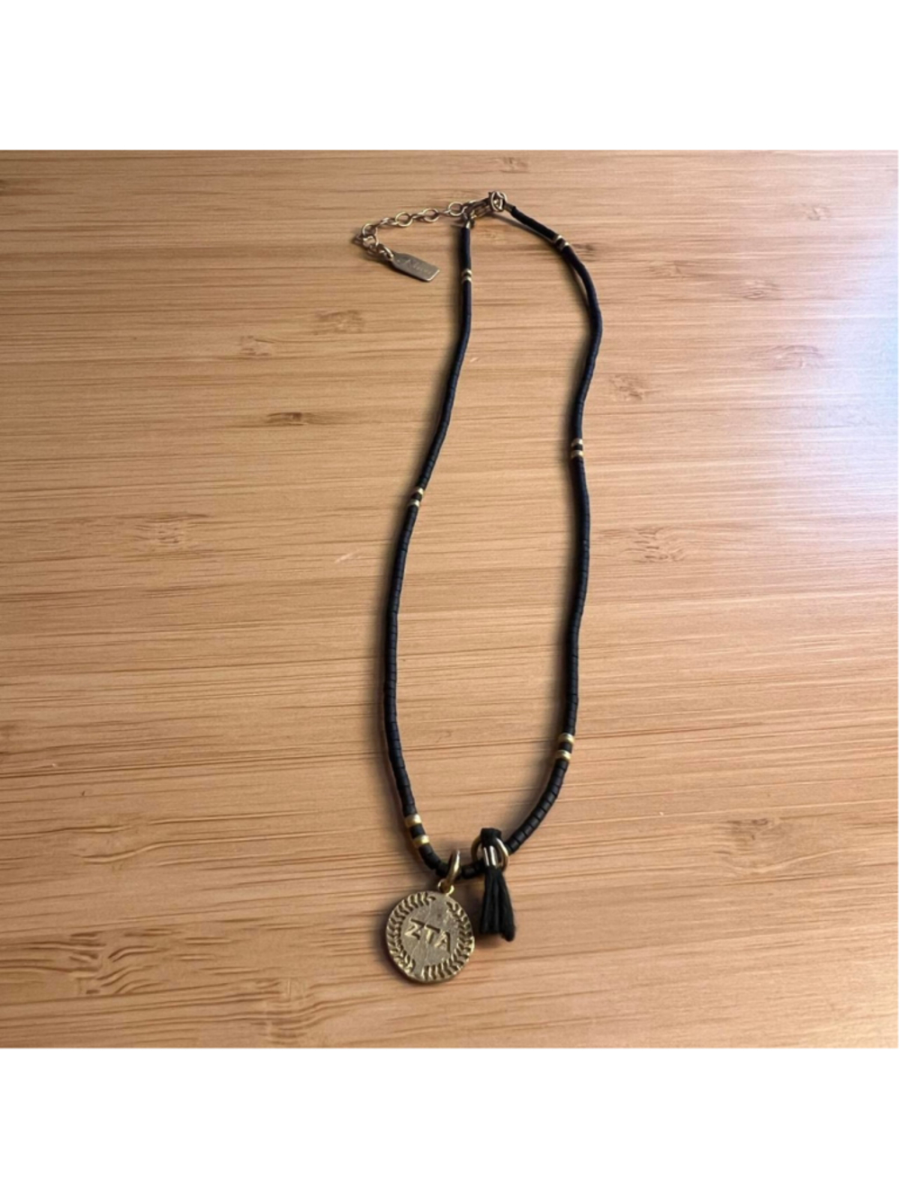 Black and gold Nava choker necklace with Zeta Tau Alpha (ZTA) sorority charm #ZT